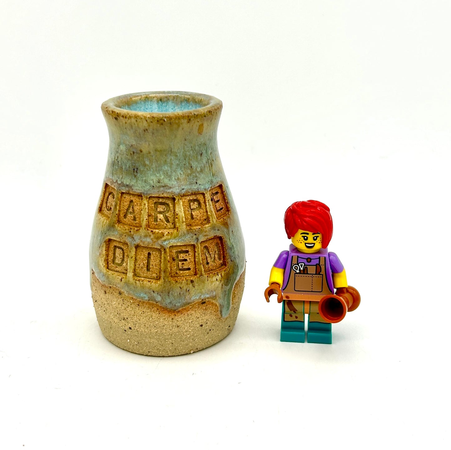 Micro 'carpe diem' bud vase in toasty clay