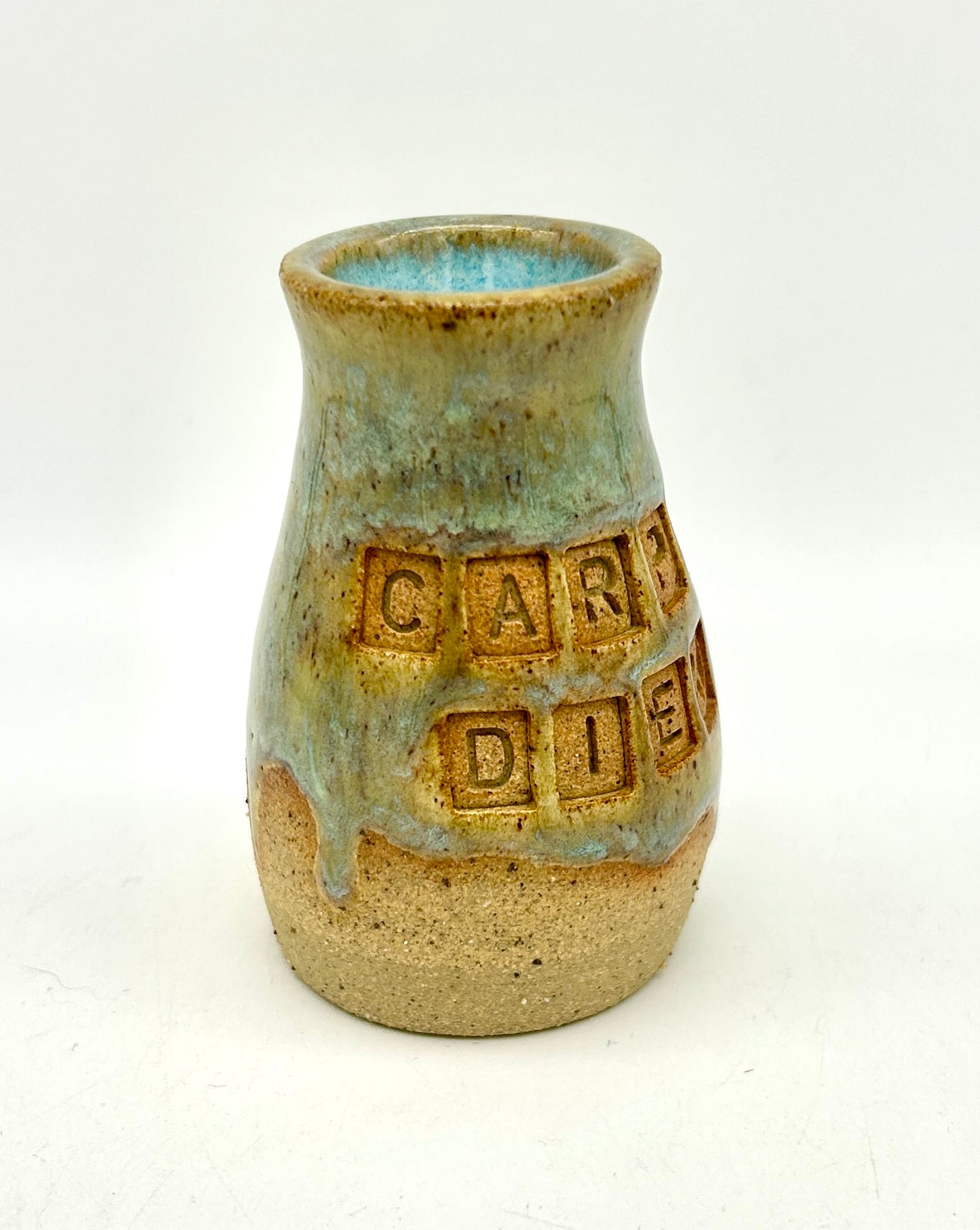 Micro 'carpe diem' bud vase in toasty clay