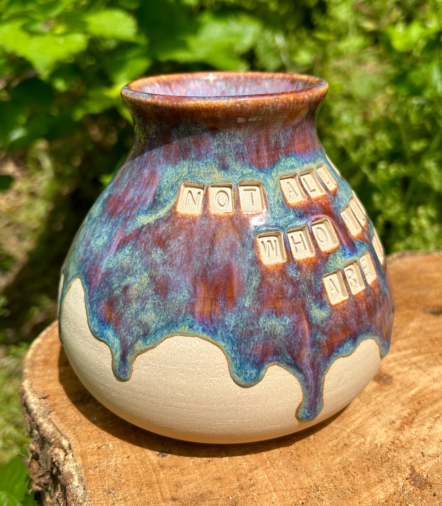 'Not all those who wander are lost' plump vase in 'heathery moors' glazes