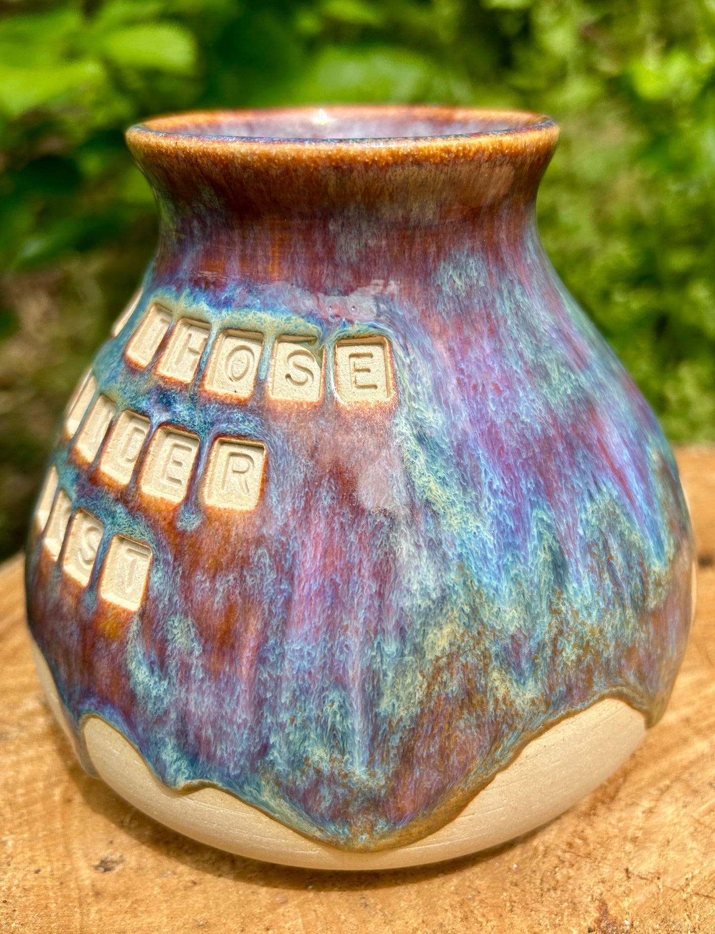 'Not all those who wander are lost' plump vase in 'heathery moors' glazes