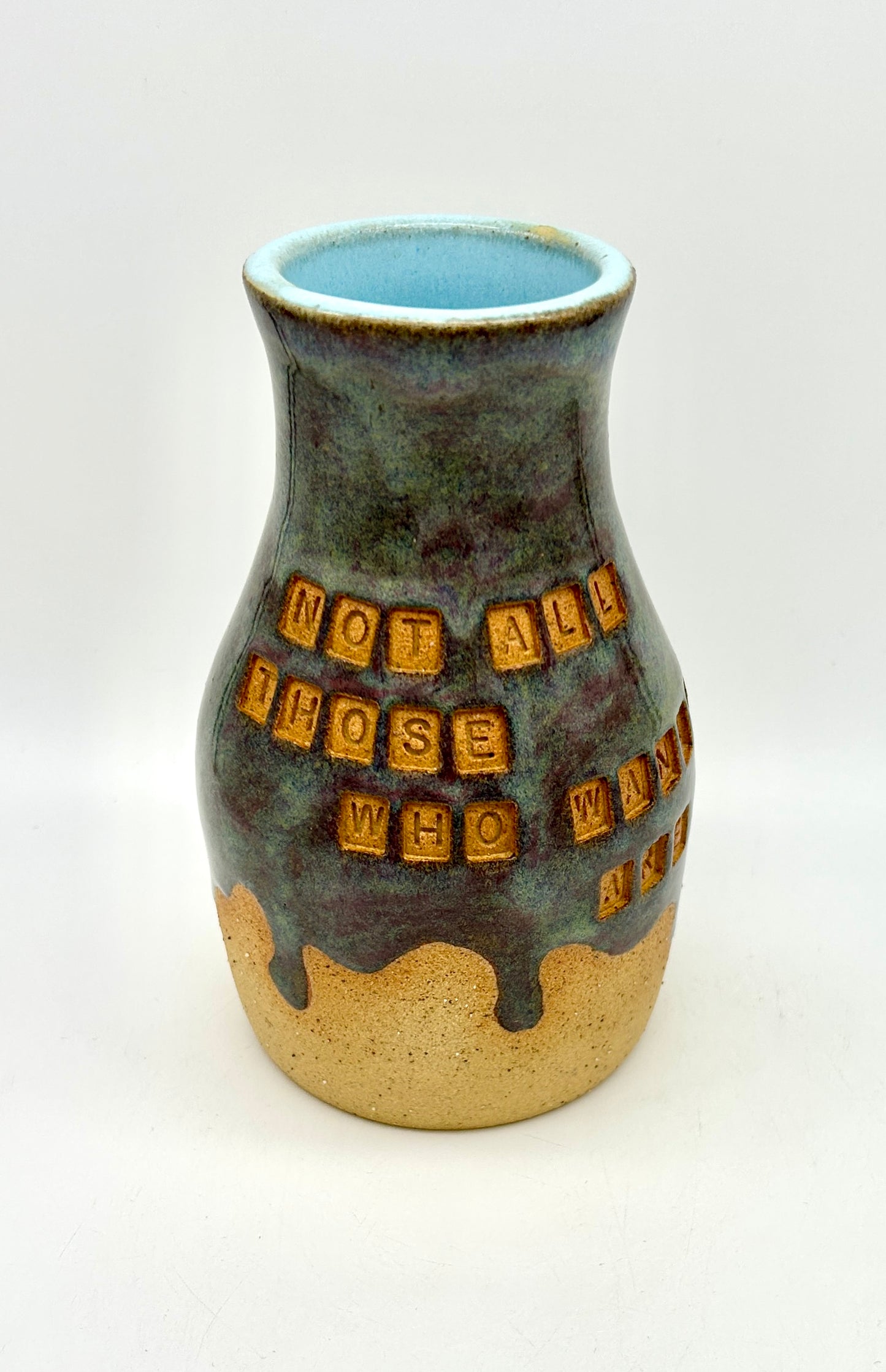 'Not all those who wander are lost' vase