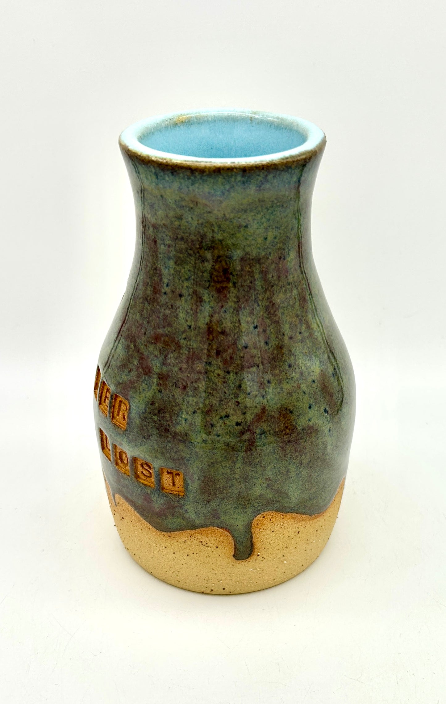 'Not all those who wander are lost' vase