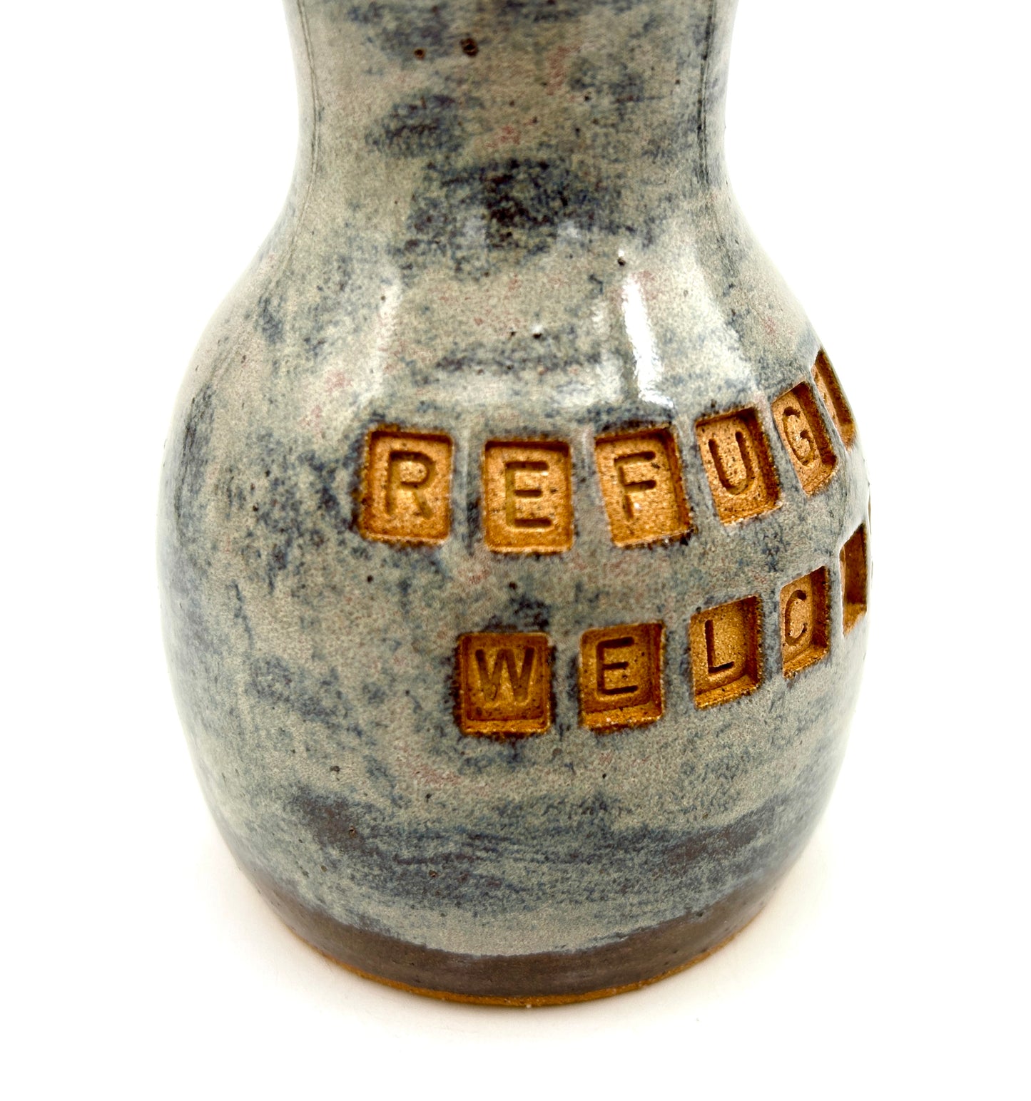 'Refugees welcome' vase in toasty clay