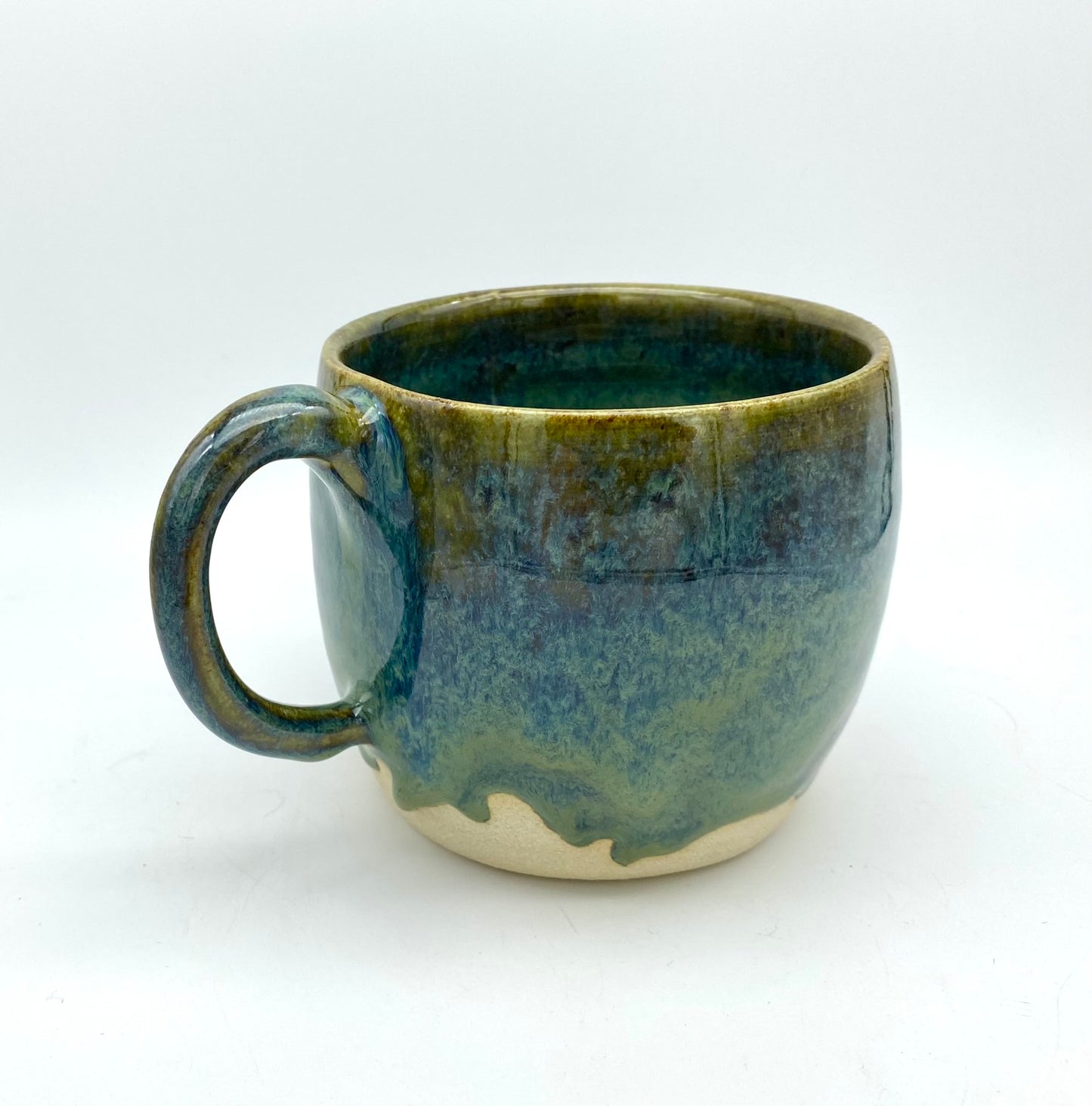 Mug in glossy greens and blues