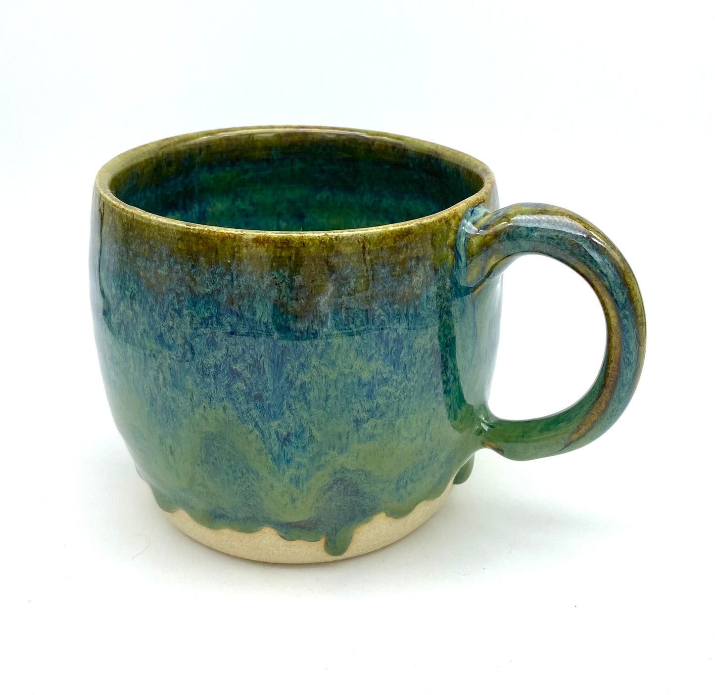 Mug in glossy greens and blues