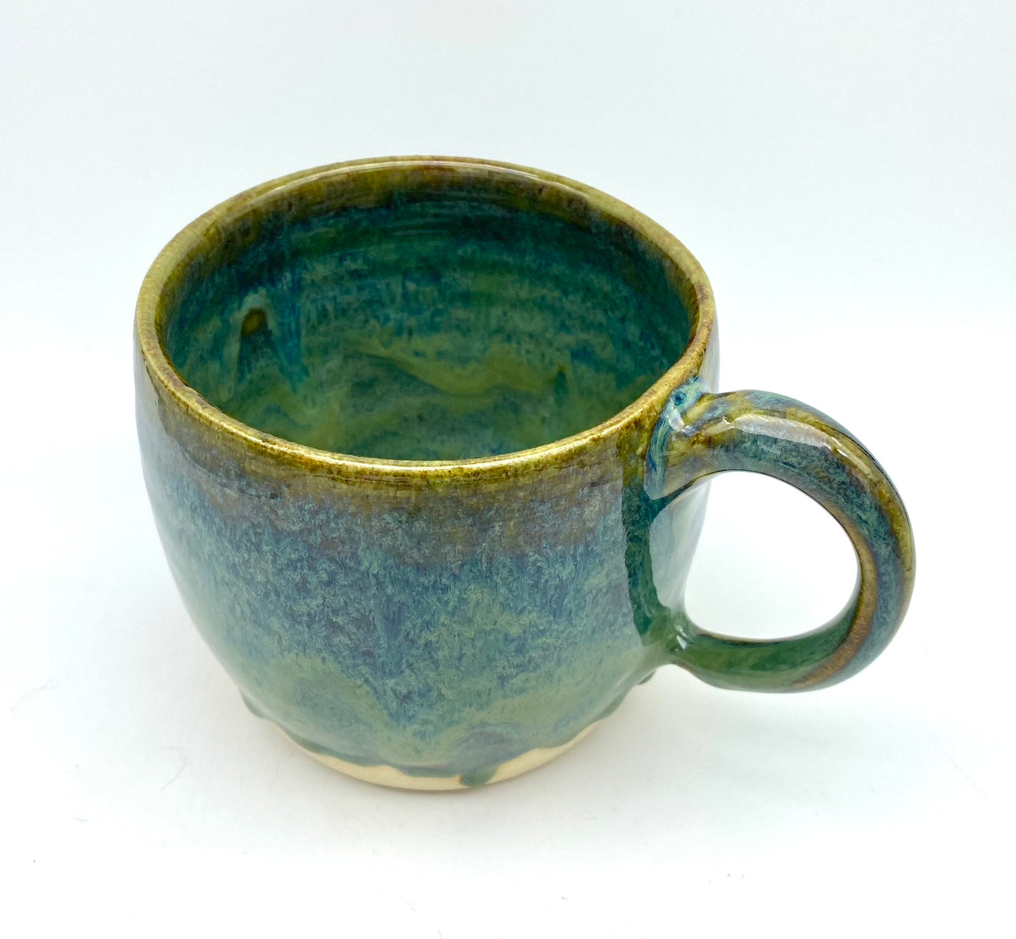 Mug in glossy greens and blues