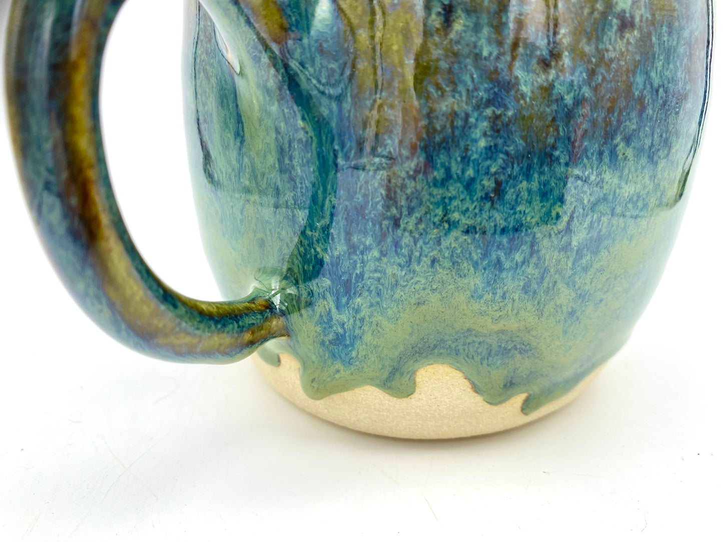 Mug in glossy greens and blues