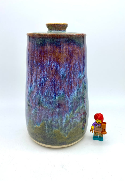 Tall lidded jar in heathery glazes