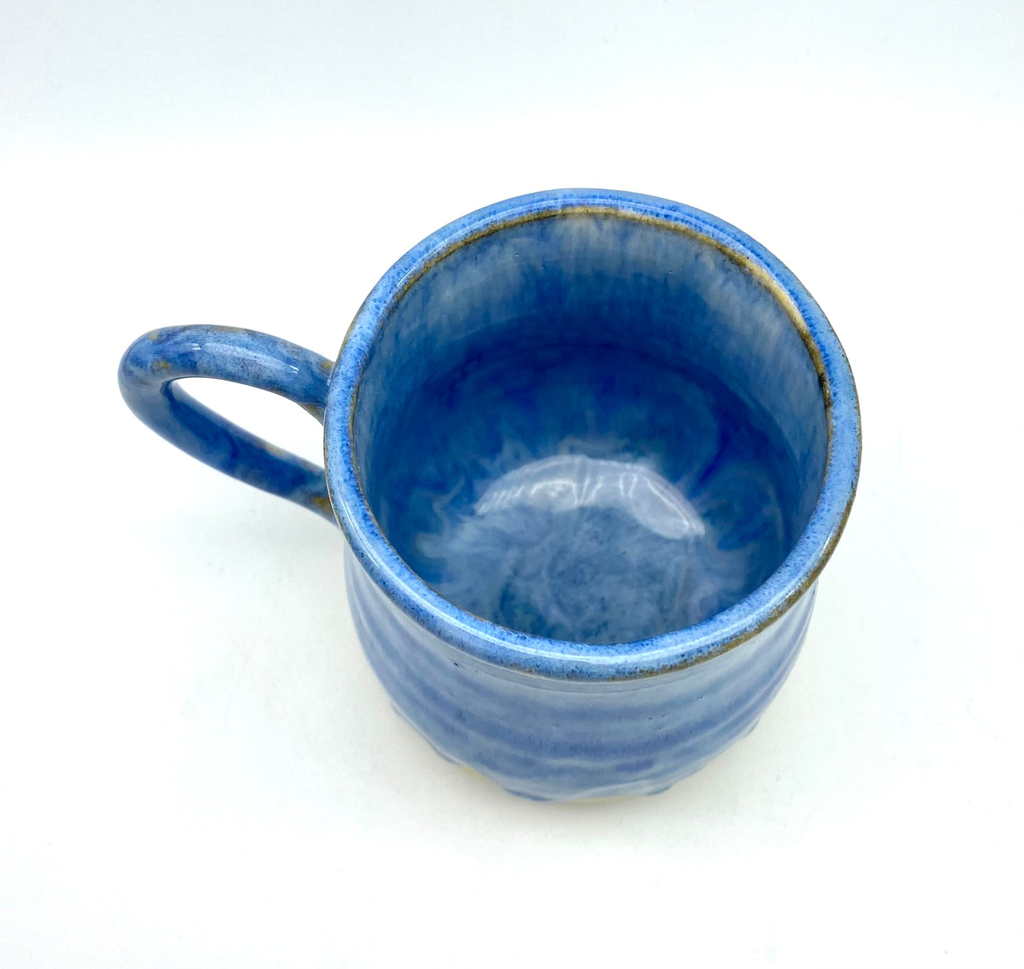 Mug in flowing blues