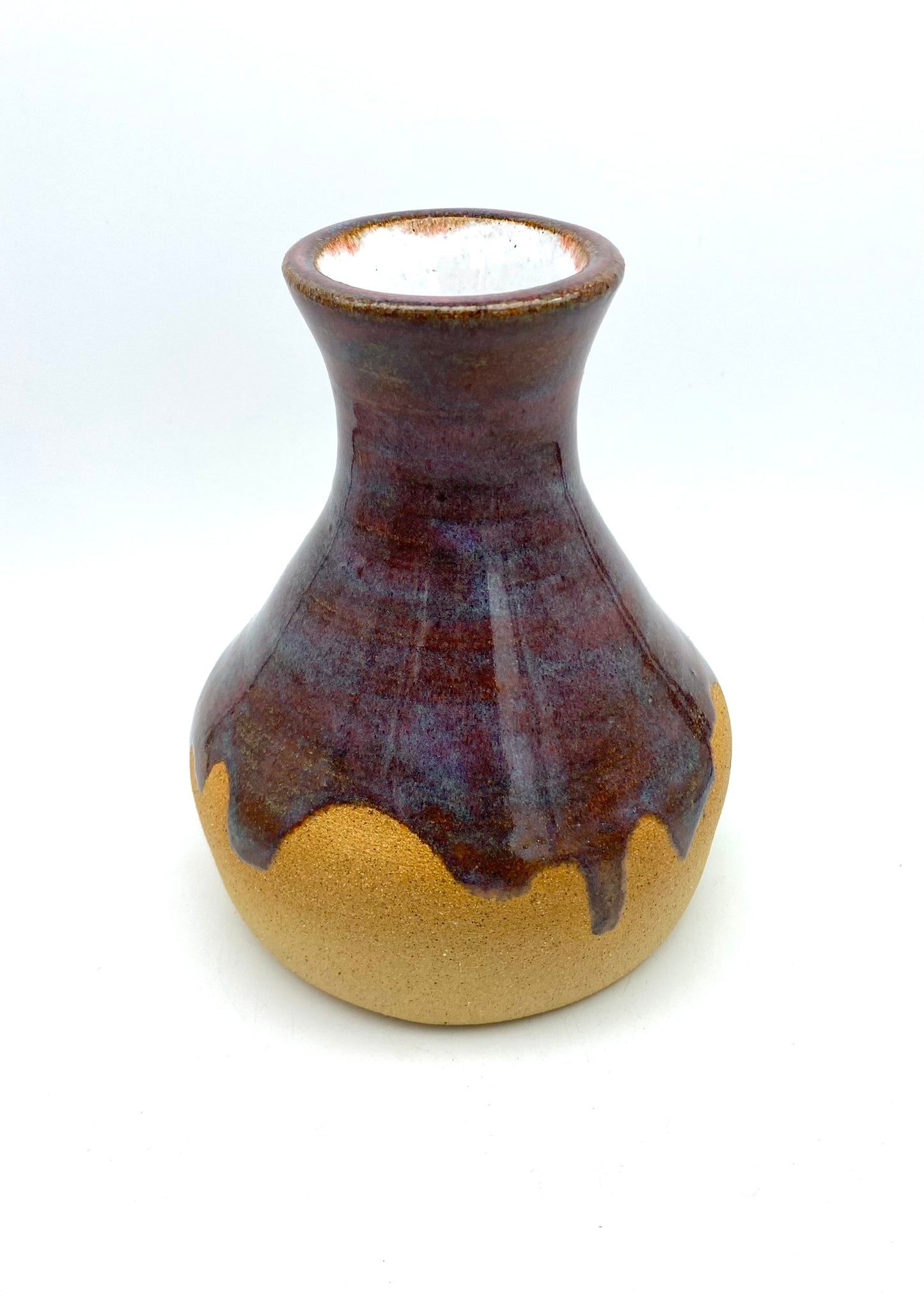 Vase in purples on toasty clay