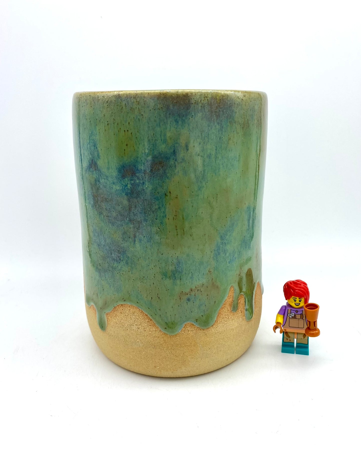 SECOND Tall vase in flowing greens on toasty clay