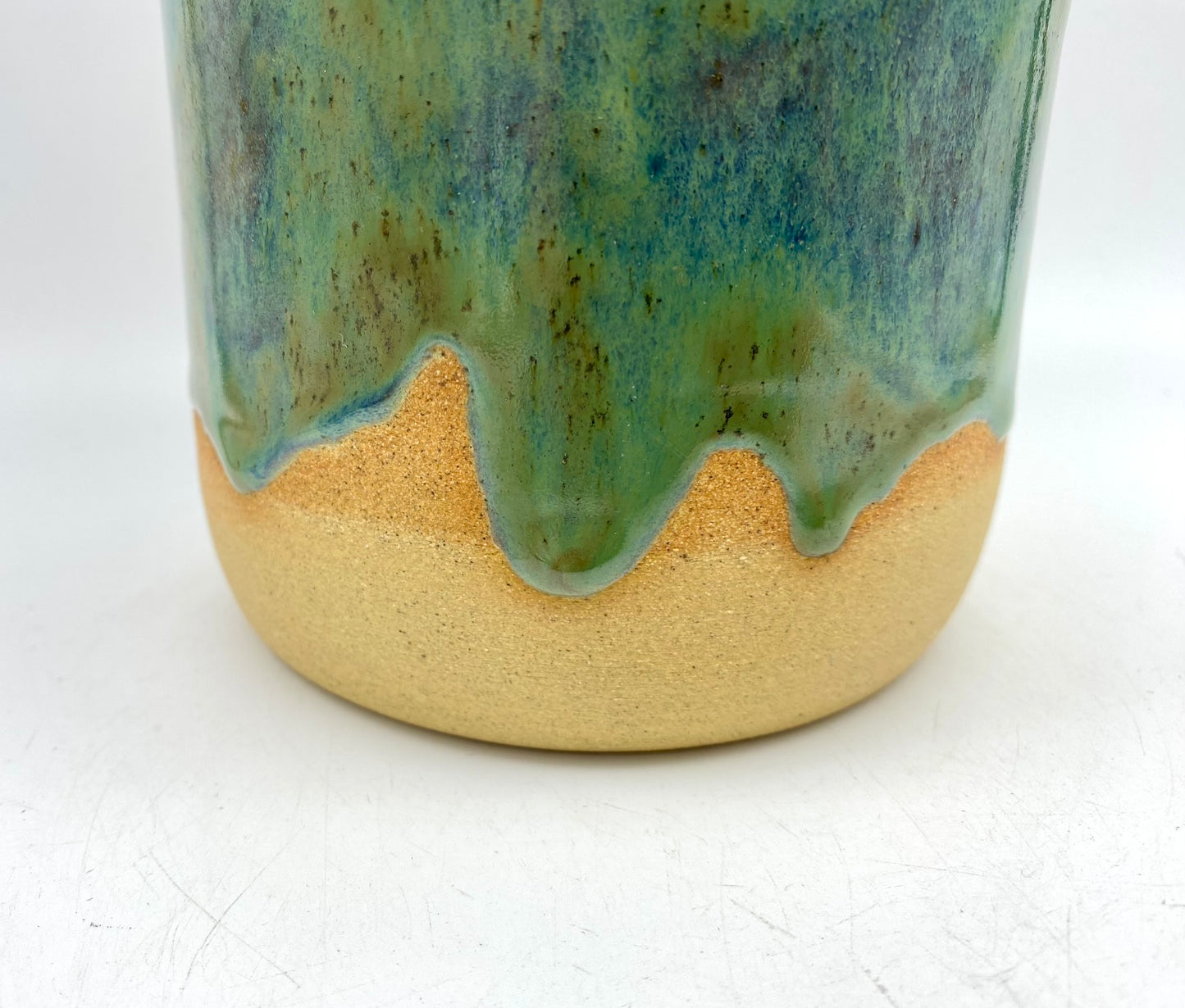 SECOND Tall vase in flowing greens on toasty clay