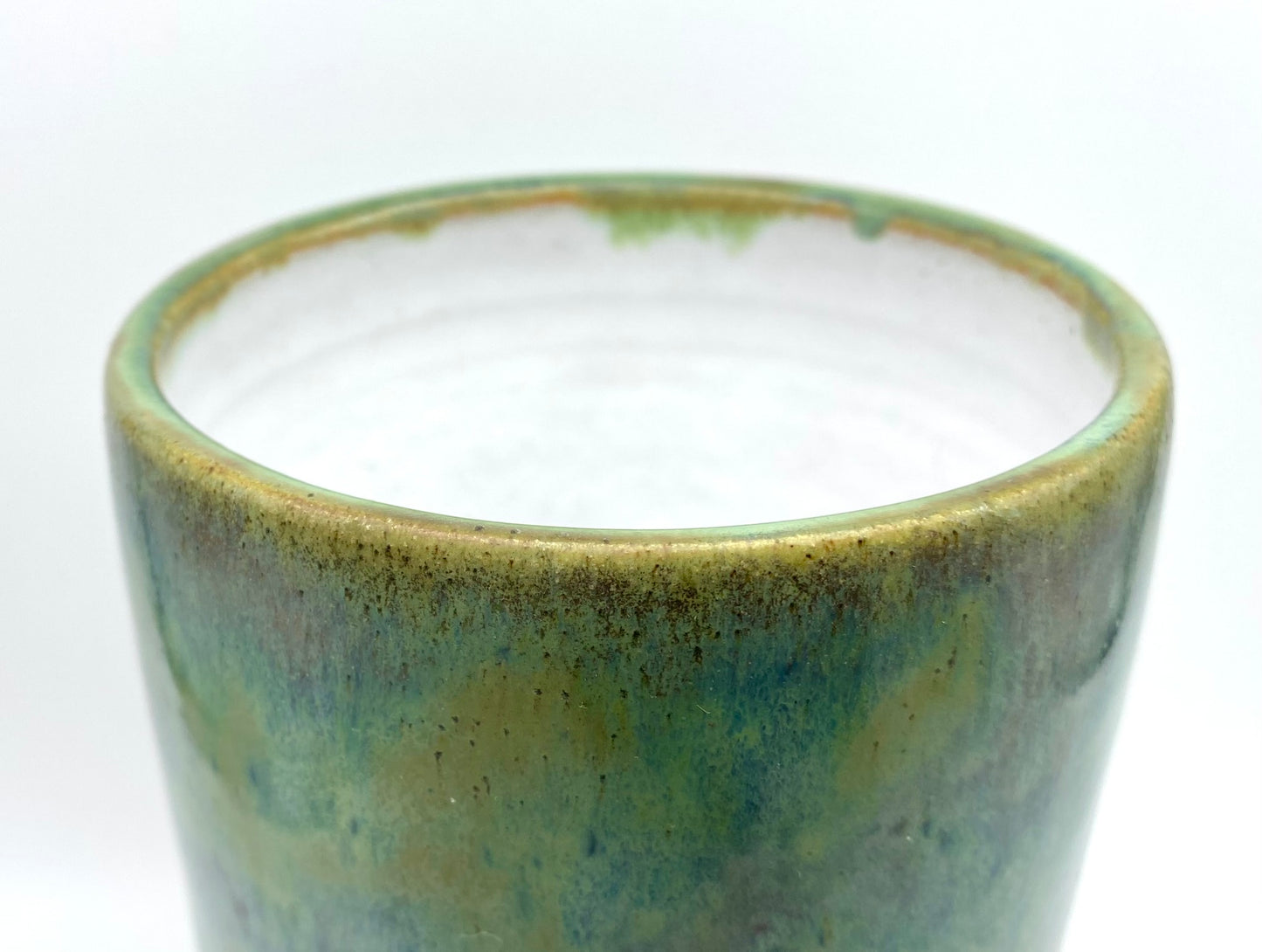 SECOND Tall vase in flowing greens on toasty clay