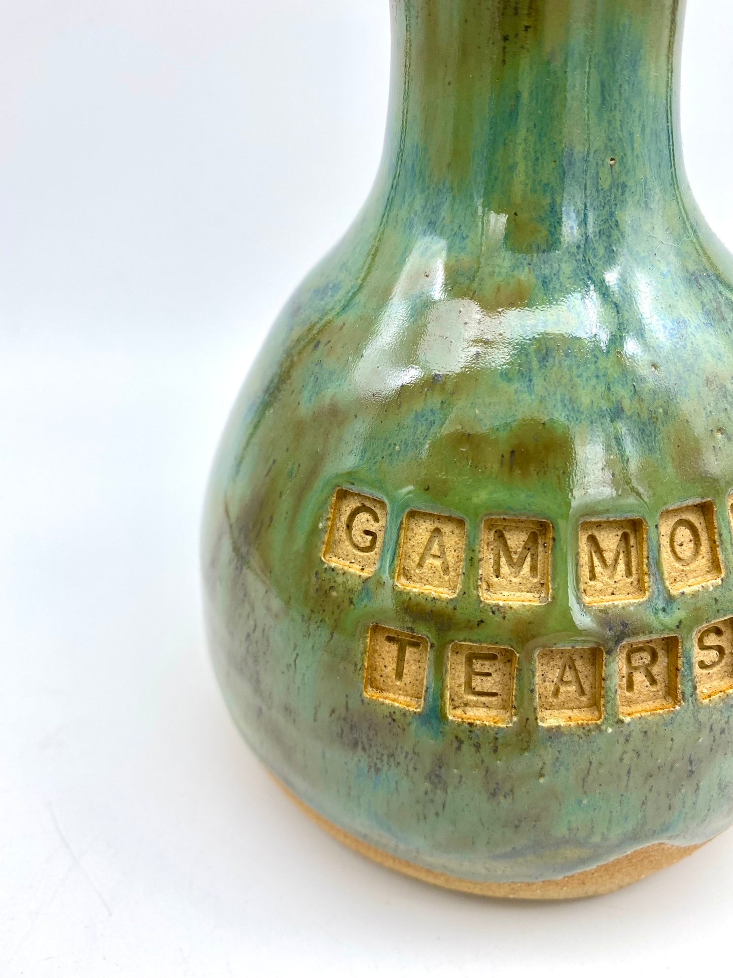 'Gammon tears' decanter in greeny blues on toasty clay