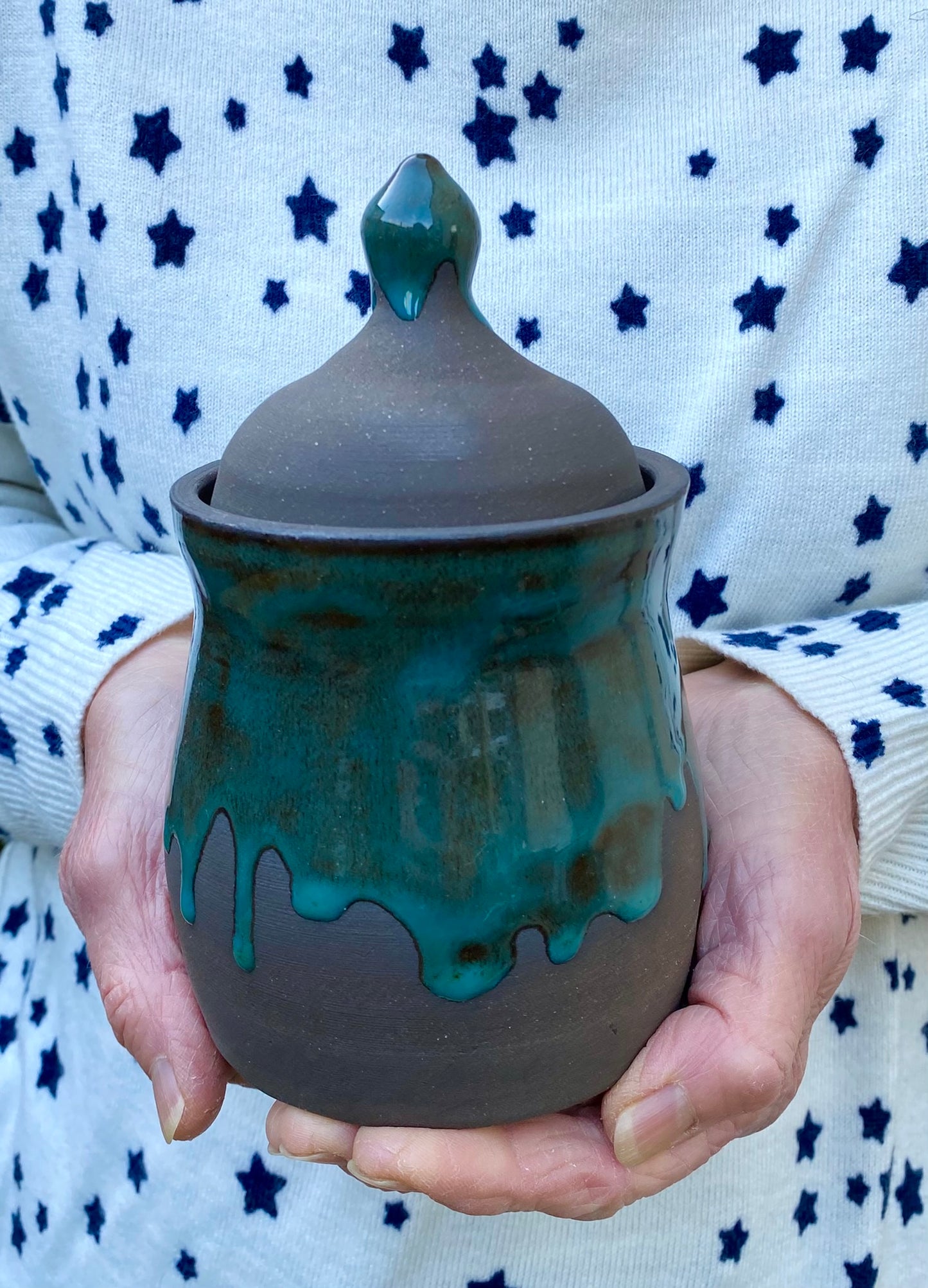 Rich dark clay lidded jar