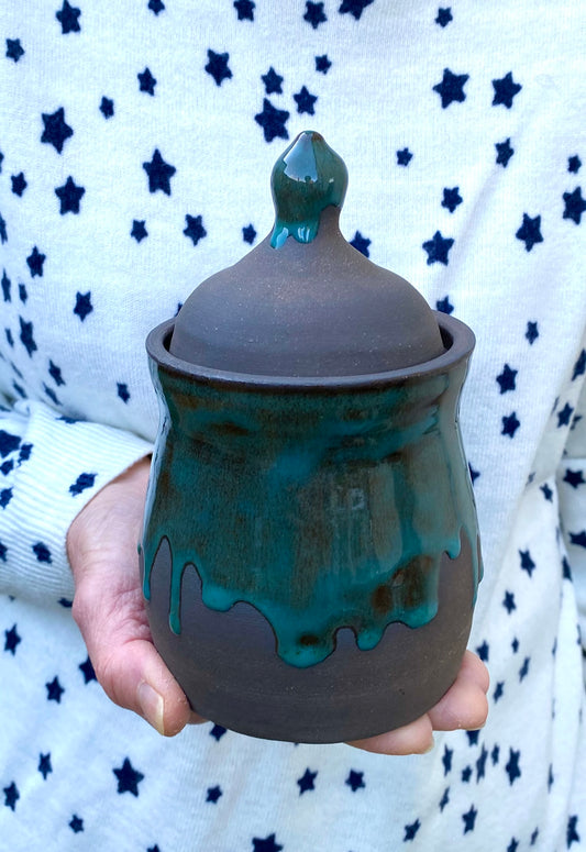 Rich dark clay lidded jar