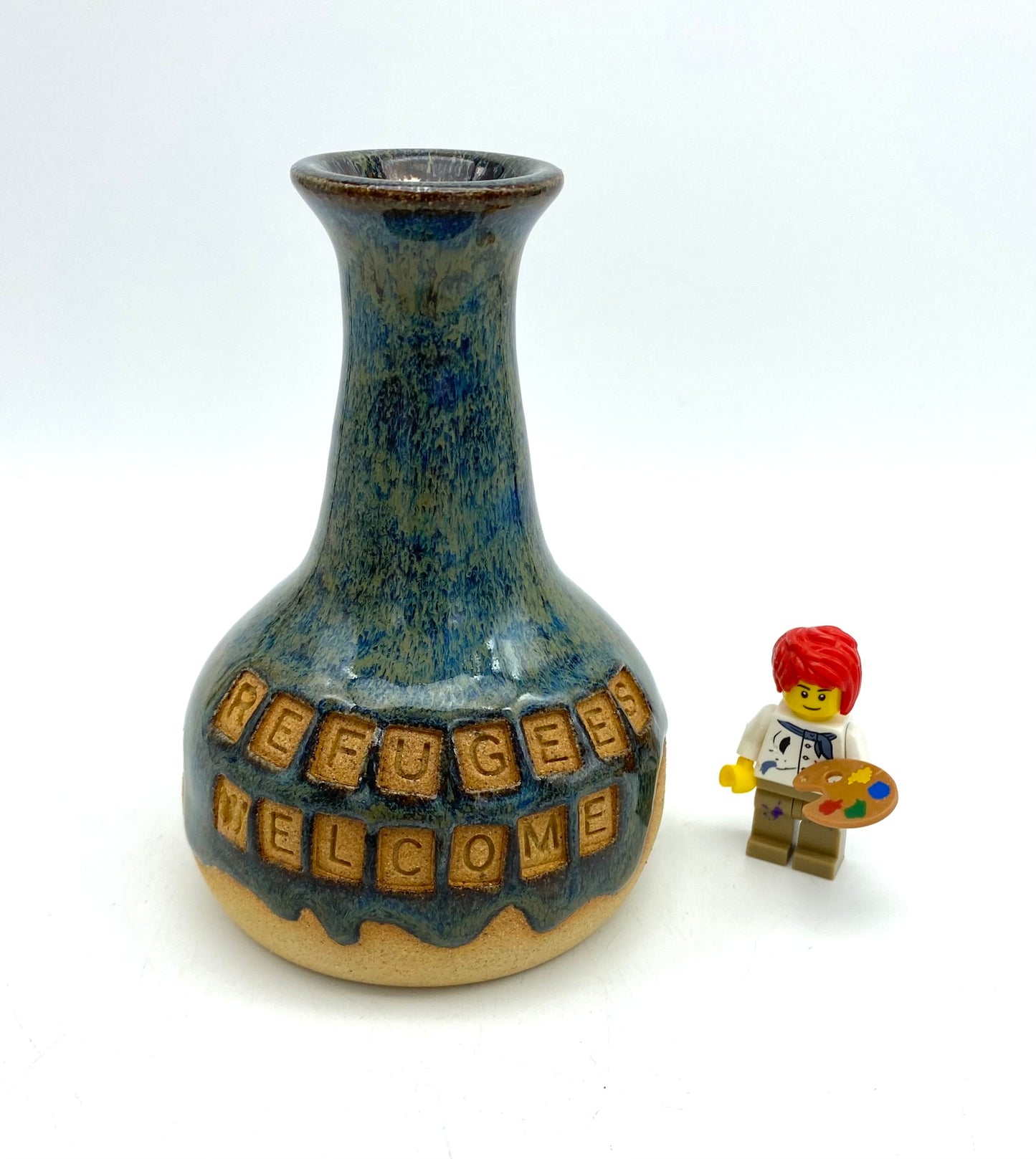 'Refugees welcome' bud vase