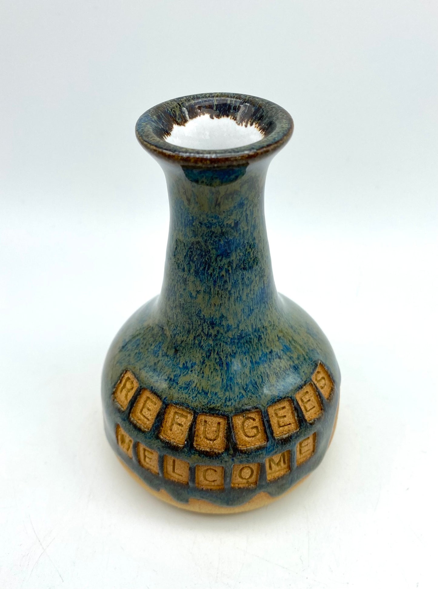 'Refugees welcome' bud vase