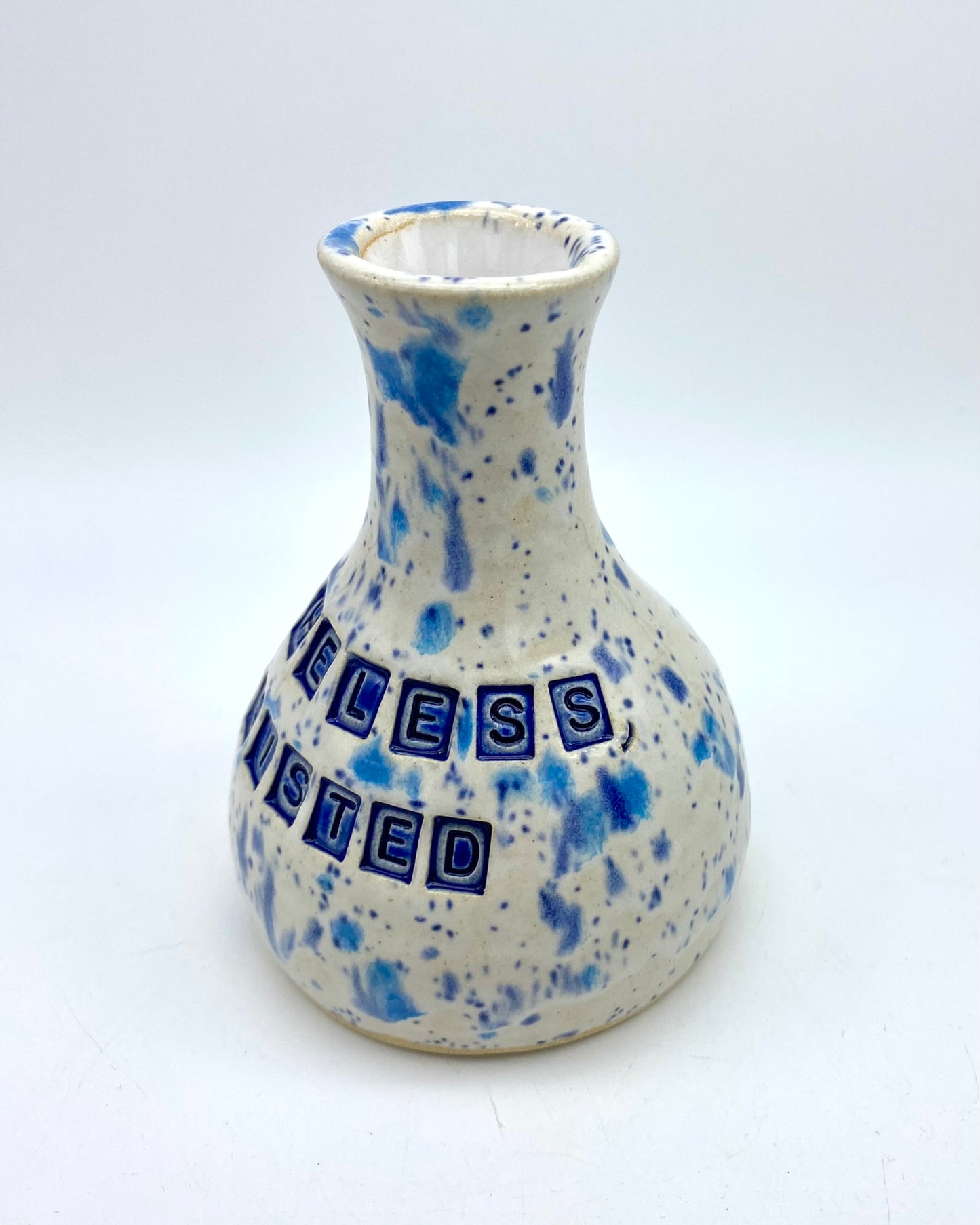 'Nevertheless, she persisted' bud vase