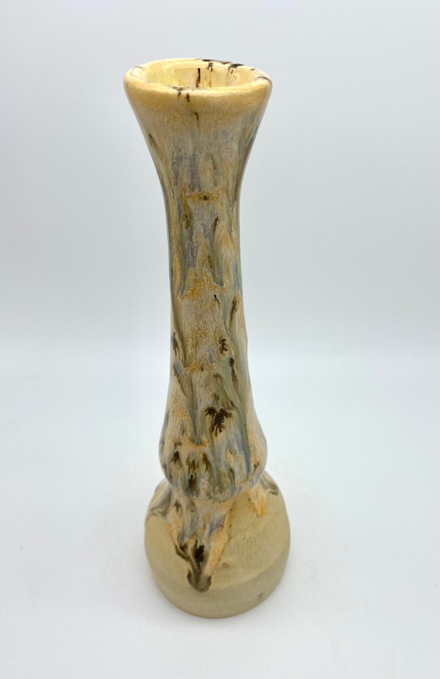 Tall candlestick in creams and browns