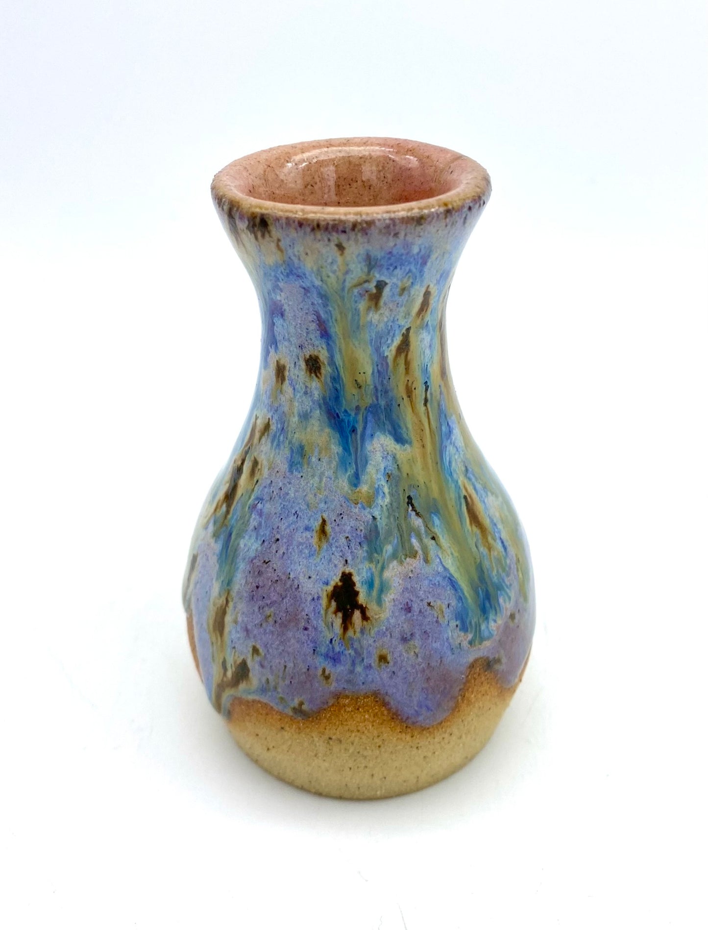 Just a stunning tiny vase in toasty clay