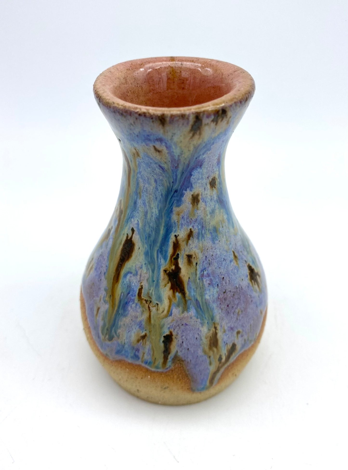 Just a stunning tiny vase in toasty clay