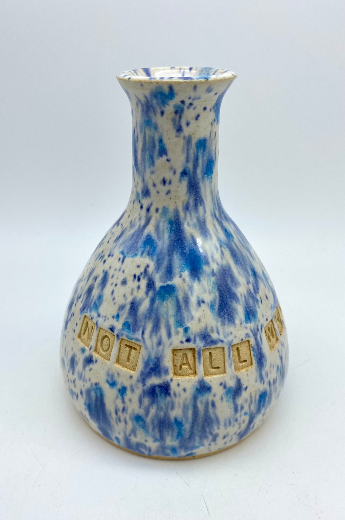 'Not all who wander are lost' bud vase in speckly blues