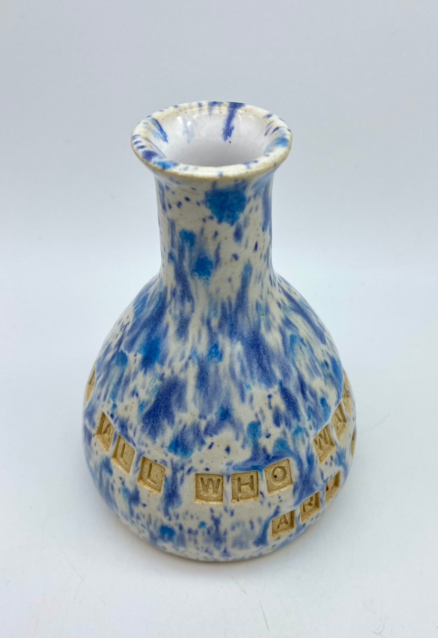 'Not all who wander are lost' bud vase in speckly blues